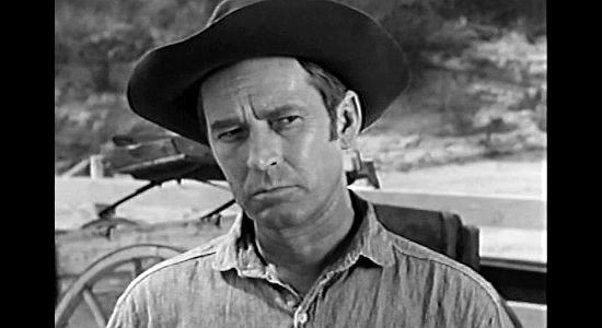 Jess Barker as Ed Halcomb, leader of the farmers who control land the ranchers want in The Peacemaker (1956)