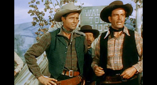 Jim Davis as Bill Miller and Douglas Kennedy as Bill Murphy, two of Frank Walsh's henchmen in The Cariboo Trail (1950)