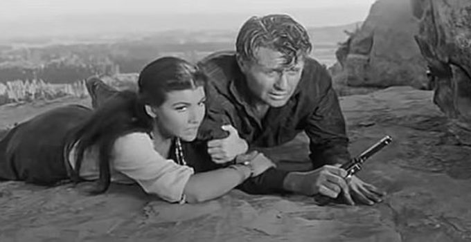Jim Davis as Ralph Carpenter, on the run from Sheriff Carl Brandon with pretty Indian girl Irene (Mara Corday) in The Quiet Gun (1957)