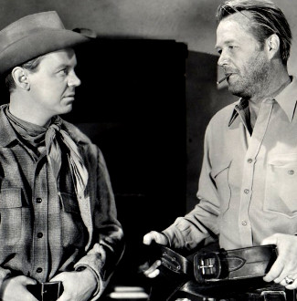Jimmy Lydon as Tom Cameron and Wayne Morris as Sam Garrett in Desperado (1954)