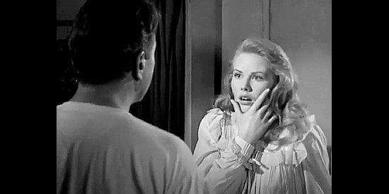Jo Morrow as Laura Foster, reacting to being struck by her father in The Legend of Tom Dooley (1959)