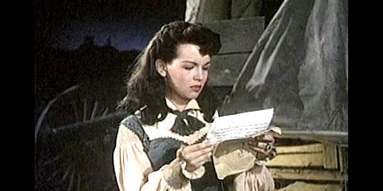 Joan Evans as Marcy Whitlock, reading a secret pro-Confederate communication in Column South (1953_