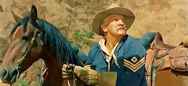 Joe Sawyer as Sgt. Hamma, sensing an Apache ambush as the cavalry approaches a pass in Taza, Son of Cochise (1954)