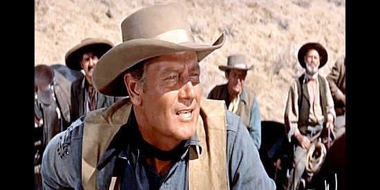 Joel McCrea as John Cord, on the watch for Garth and his men as a climatic showdown looms in Cattle Empire (1958)