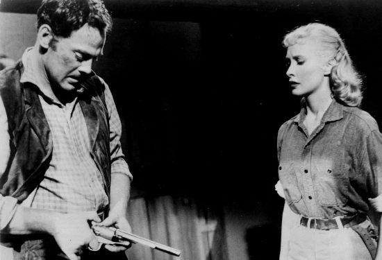 John Ager as Jeff Donner, a cowboy who meets Susan Crowley (Penny Edwards), not realizing she's a Union spy in Ride a Violent Miles (1957)