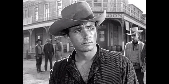 John Derek as Brock Mitchell, haunted by a killing he couldn't avoid in Fury at Showdown (1957)