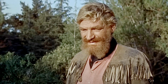 John Dierkes as Gabe Hastings, the fur trapper Harris trusts with his message in The Oregon Trail (1959)