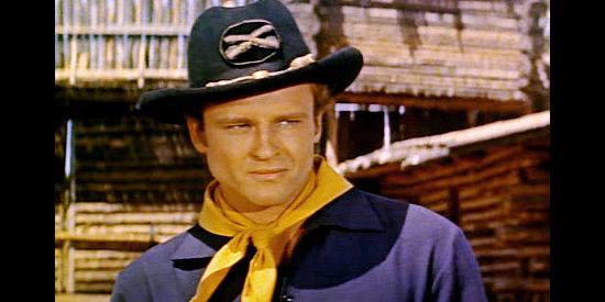 John Ericson as Lt. Niles Ord, confronted with Indian trouble and female complications in Oregon Passage (1958)