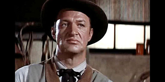 John Larch as Jed Givens, the man who frames Hemp Brown for the theft of a cavalry payroll in The Saga of Hemp Brown (1958)