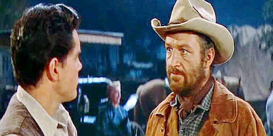 John Larch as Stringer, a rancher on the verge of bankruptcy, confronting Bless Keough in Gun for a Coward (1956)