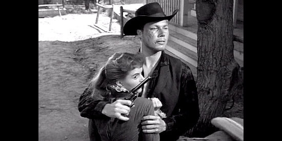 John Smith as Miley Sutton, using Ginny Clay as a shield in Fury at Showdown (1957)