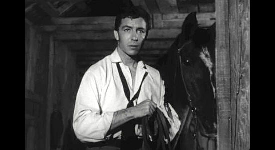 John Sullivan as Louis Middletown, trying to escape from Pa Clellan and his gang in Seven Guns to Mesa (1958)