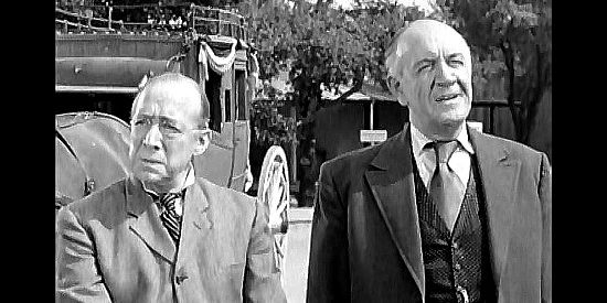 Joseph Forte as Andrew Ferguson and Addison Richards as Charles Hanford, co-owners of the bank in Fury at Gunsight Pass (1956)