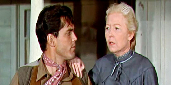 Josephine Hutchinson as Mrs. Keough, trying to convince Bless Keough (Jeffrey Hunter) to return East with her in Gun for a Coward (1956)