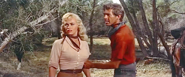 Karen Steele as Mrs. Lane and James Coburn as Whit head for cover with a final showdown imminent in Ride Lonesome (1959)
