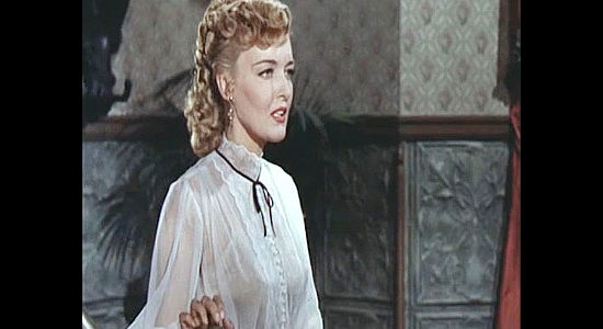 Karin Booth as Julie Hanson, worried that her prospecting father is putting himself in danger in Cripple Creek (1952)