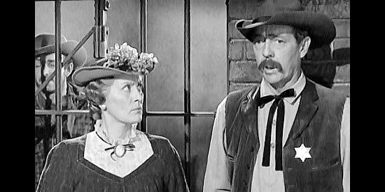 Katherine Warren as Mrs. Boggs and Frank Fenton as Sheriff Meeker, wondering where the bank loot went in Fury at Gunsight Pass (1956)