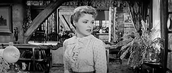 Kathleen Crowley as Teresa Carpenter, returning to Red Rock to find her estranged husband dead in The Quiet Gun (1957)