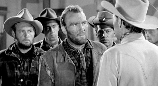 Lane Bradford as Purdy and his friends, agreeing to join Jim Kirk's cattle drive East in The Longhorn (1951)
