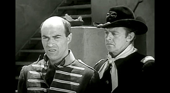 Lawrence Dobkins as Don Miguel Sebastian, surrendering to U.S. troops, including Lt. Scott Johnson (Harry Lauter) in Raiders of Old California (1957)