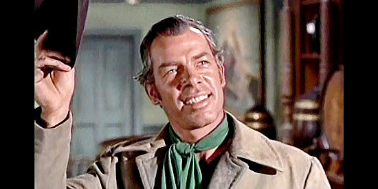 Lee Marvin as Bill Masters, offering his services to outlaw Payte Bodeen in Seven Men from Now (1956)