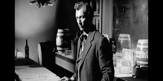 Lee Van Cleef as Faro, plotting with King Fisher to rid the world of Jacob Wade in The Lonely Man (1957)