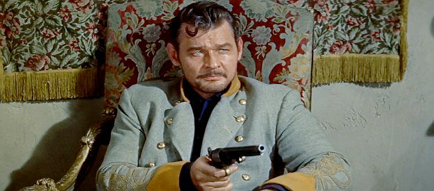 Leo Gordon as WIlliam Clarke Quantrill, planning a raid of the federal arsenal in Lawrence, Kansas in Quantrill's Raiders (1958)