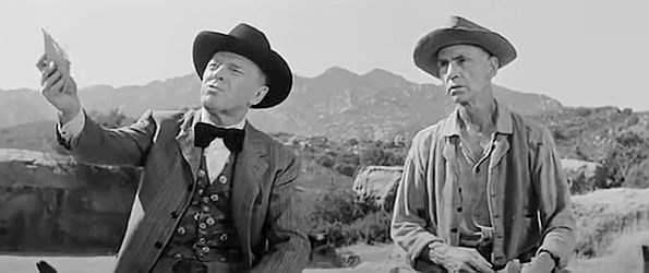 Lewis Martin as attorney Steven Hardy and Hank Worden as Samson, confronting Carpenter about his unusual living arrangement in The Quiet Gun (1957)