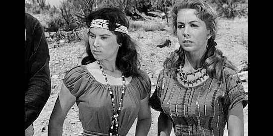 Lisa Montell as Tula and Susan Cummings as Ellen Carter, found in an Apache camp by the cavalry patrol in Tomahawk Trail (1957)