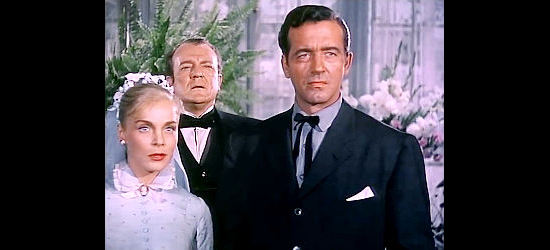 Lizabeth Scott as Rose Evans and John Payne as Dan Ballard, their wedding interrupted in Silver Lode (1954)