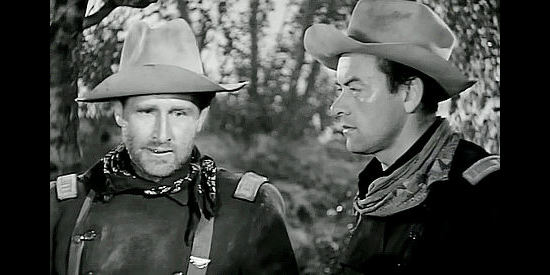 Lloyd Bridges as Capt. Donlin and John Ireland as Lt. Haywood, officers at odds over a woman in Little Big Horn (1951)