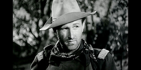 Lloyd Bridges as Capt. Donlin, determined to get a warning to Custer in Little Big Horn (1951)