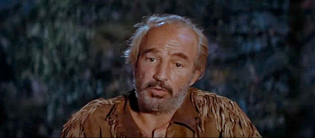 Lloyd Nolan as Woodfoot, asking Charlie Gilson how he feels when he kills in The Last Hunt (1956)