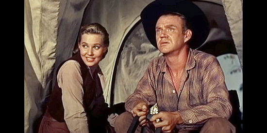 Lola Albright as Meg Alden and Dabbs Greer as John Brewster, hoping for a safe trip West in Pawnee (1957)