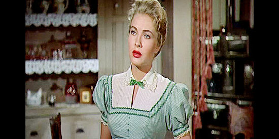 Lori Nelson as Martha Phillips, niece of Henry Skinner, upset with the way Tom Destry is enforcing the law in Destry (1954)