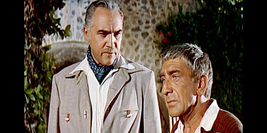 Lorne Green as King O'Reilly and Eduard Franz as Father Jose, facing a difficult decision in The Last of the Fast Guns (1958)