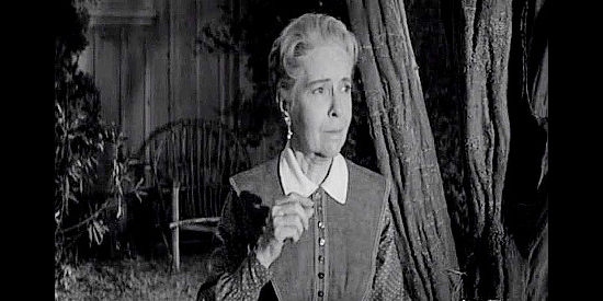 Madge Kennedy as Mary East, concerned when her new husband heads to town without disclosing his reason in Plunderers of Painted Flats (1959)