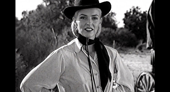 Maria Hart as Queenie Hart, trying to salvage her herd, her ranch and get her man in Cattle Queen (1951)