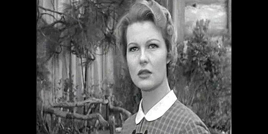 Mary Castle as Louise McCord, reacting to a startling revelation in The Last Stagecoach West (1957)
