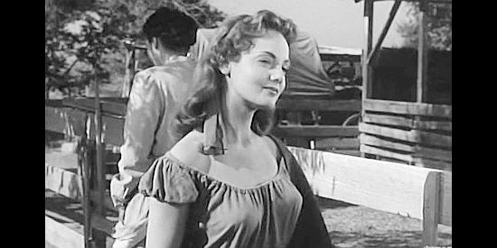 Mary Ellen Kay as Charity Hemp, determined to get the attenton of Capt. Dave Storm's troopers in Thunder Pass (1954)