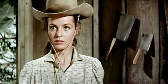 Mary Murphy as Lucy Lee, realizing one of her trusted employees has been feeding information to the Wild Bunch in The Maverick Queen (1956)