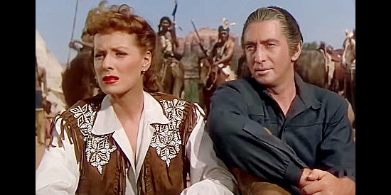 Maureen O'Hara as Katie Howard and Macdonald Carey as James Bowie, visiting the Comanche camp in Comanche Territory (1950)