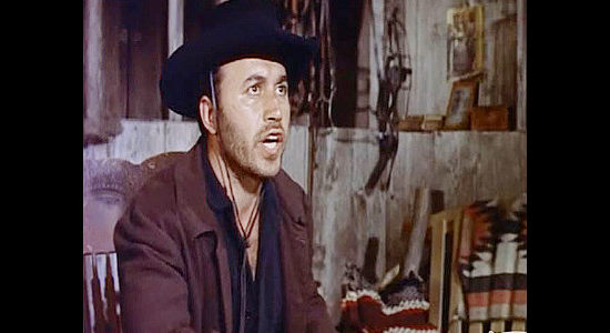 Michael Ansara, trying to convince the outlaw leaders he's not an undercover agent in Last of the Badmen (1957)