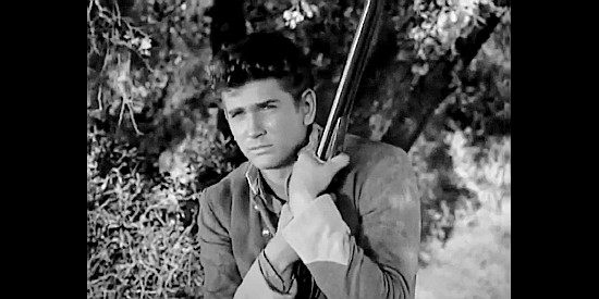 Michael Landon as Tom Dooley, about to hit a Union stagecoach in The Legend of Tom Dooley (1959)
