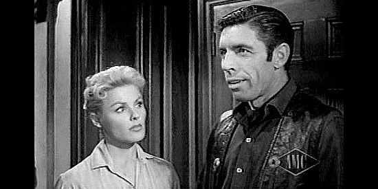 Michael Pate as Drake Robey, answering Dolores Carter's (Kathleen Crowley;s) call for a hired gun in Curse of the Undead (1959)