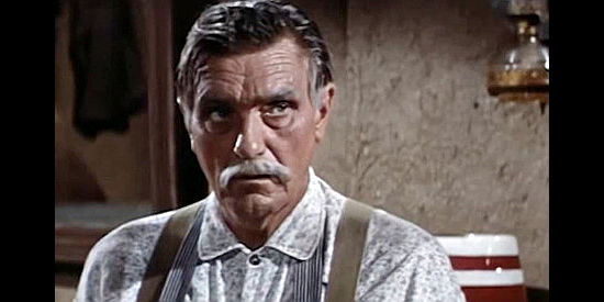 Morris Ankrum as Bo Slater, the bar owner who's witness to the fact that Jed Givens is alive and well in The Saga of Hemp Brown (1958)