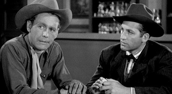 Myron Healey as Andy, conspiring with Moresby (John Hart) to take Jim Kirk's money or is cattle in The Longhorn (1951)