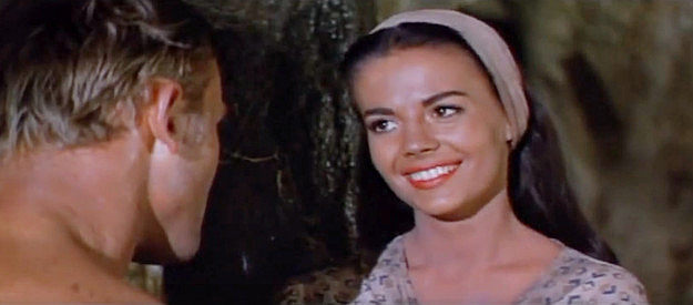 Natalie Wood as Maria Colton, thrilled to find someone willing to stand up to Jack Sutton in The Burning Hills (1956)