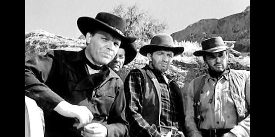 Neville Brand as Dirk Hogan, waiting with his gang for his partners to show up in Fury at Gunsight Pass (1956)