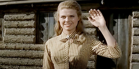Nina Shipman as Prudence Cooper, one of the settlers heading West in The Oregon Trail (1959)